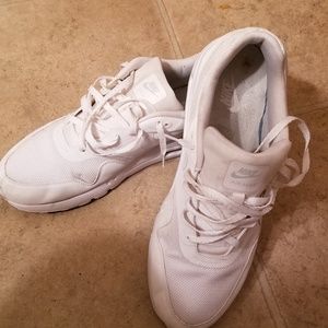 All white Nike Air Max.